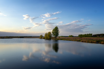 may landscape on the river Bank with trees, Russia, Ural