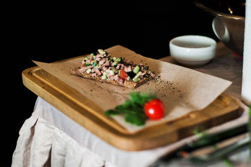 Salad on a tray. Delicious dinner.