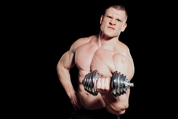 Fototapeta na wymiar male bodybuilder with dumbbells power workout black