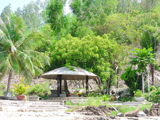 gazebo with a stone dome on the beach for relaxation