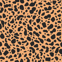 Cheetah vector hand-drawn seamless pattern. Animal print background