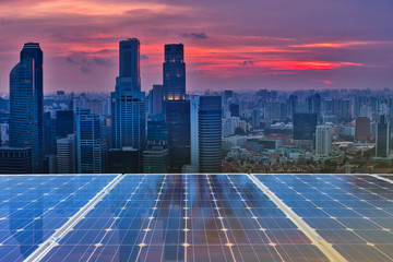 Solar panel over cityscapes, solar power green energy for life concept,City Singapore Skyline.
