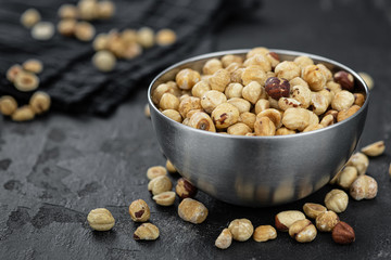 Peeled Hazelnuts (close up shot; selective focus)