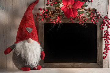 background with blackboard for Christmas texts with lights and gnomes
