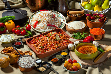 cooked and uncooked haricot beans, served with traditional cooked rice and Traditional red lentil...