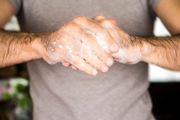 Washing hands rubbing with soap man for corona virus prevention, hygiene to stop spreading coronavirus
