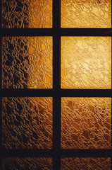 Fragment texture of decorative glass. Wired glass pattern with the light through it.