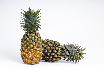 Fototapeta premium Whole fresh pineapple fruit on white background