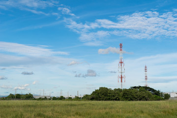 Telecommunications tower with blue sky background