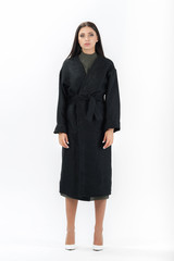 Fototapeta premium brunette posing in clothes for a catalog on a white background