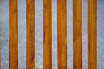 Close-up photographed yellow wooden fence  © Danijel Hunjek