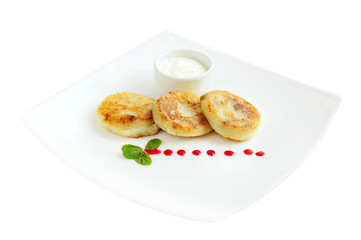 Homemade cottage cheese pancakes on the white