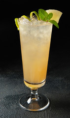 Cocktail close-up on a black background