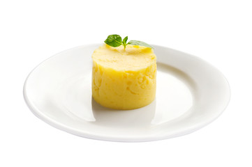 Plate with mashed potatoes on white background