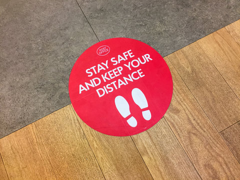 London, UK. May 11th 2020: Houndsditch post office. Customer floor sign, warning to stay safe and keep your distance. Lockdown, coronavirus outbreak, safety sticker, social distancing in a public area