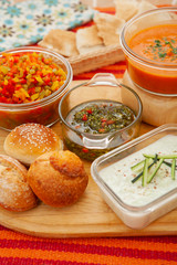 Different vegetable sauces to accompany a barbecue.