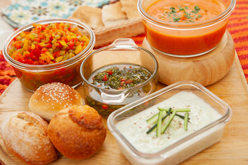 Different vegetable sauces to accompany a barbecue.