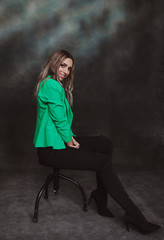 Beautiful, glamourous caucasian blonde girl posing in studio on isolated background. Style, trends,...