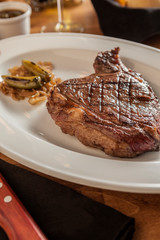 Argentine style meat cut with roasted vegetables.
