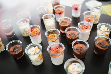 photo of small dessert cups on a table