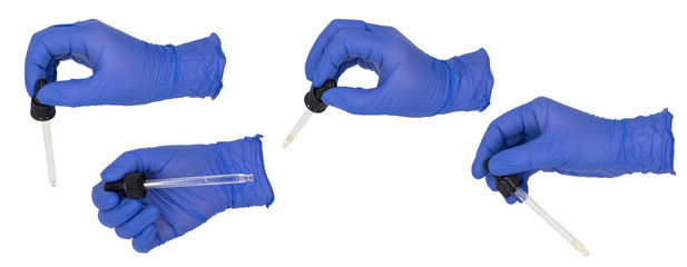 Woman's hand wearing a blue nitrile examination glove holding a pipette in various poses. Isolated on a white background.  No Skin