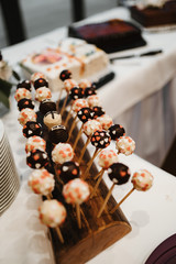 photo of a chocolate lolly pops stand on a table