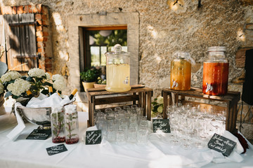 photo of a jug drinks table outdoor in a party