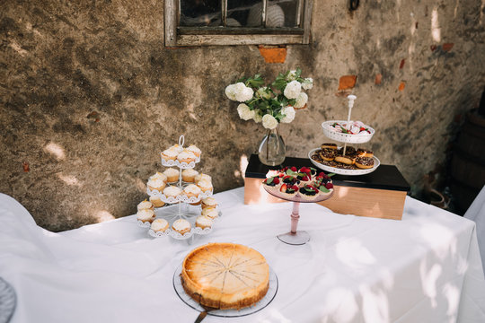 photo of a dessert table in an outdoor party