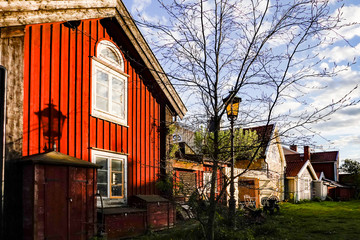 Kalmar, Sweden The grassy backyard to a red wooden house in the old town. © Alexander