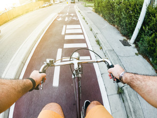 Personal point of view of a man during his bicycle trip in a bicycle lane - POV