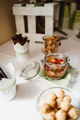 photo of candy bar jars on a table