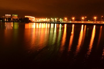 Fototapeta na wymiar night city waterfront water reflection beautiful