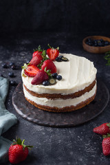 Cake with cream and berries