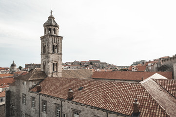 Fototapeta na wymiar The old town in Dubrovnik Croatia. View from walls around Dubrovnik in Croatia. Very atmospheric photo. Generic view over the town and rooftops.