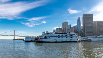Fototapeta premium San Francisco, the Embarcadero, downtown, view from the pier, panorama with a cruise ship 