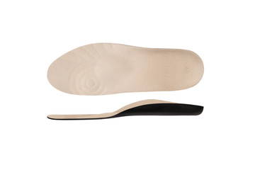 Isolated orthopedic insole on a white background. Treatment and prevention of flat feet and foot diseases. Foot care, comfort for the feet. Wear comfortable shoes. Medical insoles. Flat Feet Correctio