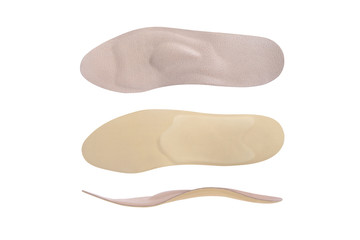 Isolated orthopedic insole on a white background. Treatment and prevention of flat feet and foot diseases. Foot care, comfort for the feet. Wear comfortable shoes. Medical insoles. Flat Feet Correctio