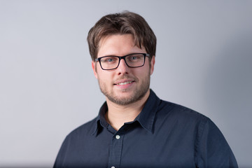 Obraz premium Young businessman with shirt and blue eyes