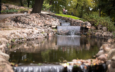 Fototapeta premium A small waterfall in the park