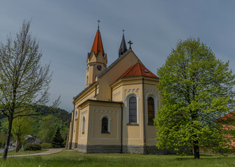 Fototapeta na wymiar Church of saint Antonin Paduansky in Dolni Becva village in spring color day