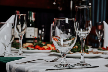 empty wine glasses on the restaurant's dining table