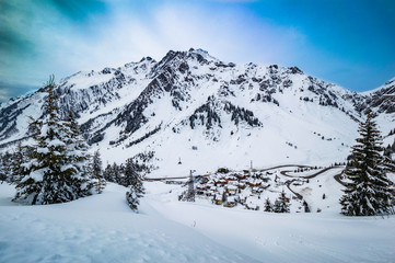 Fototapeta na wymiar View from ski slope on-mountain village in Ski Arlberg