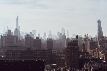 Fototapeta premium A beautiful image capturing the New York City Skyline from the rooftop of The Cathedral Church of St. John the Divine.