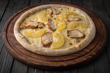 Tasty hot italian pizza with chicken and pineapple. Pizzeria menu. Concept poster for Restaurants or pizzerias