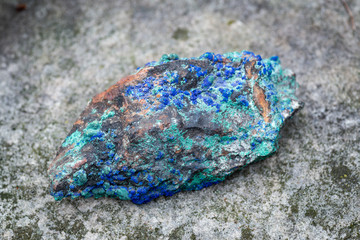 The accretion of Malachite and Azurite. Natural raw specimen of copper-based gemstones.
