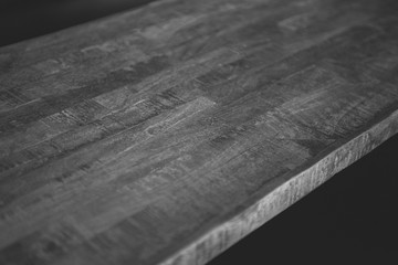 A close up of a wooden table with wood texture