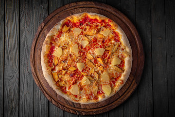 Tasty hot italian pizza with chicken and pineapple. Pizzeria menu. Concept poster for Restaurants or pizzerias