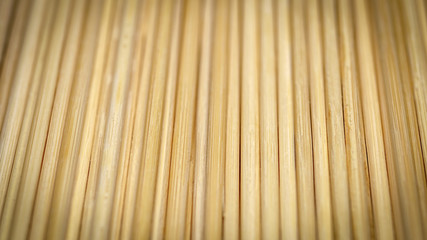 Skewer background,
 Pile of Wooden Sticks or Bamboo Skewers Used to Hold Pieces of Food Together. Background.
