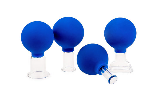 Glass facial and body cupping set isolated on white background. Face and body anti-aging, cellulite and fat loss.