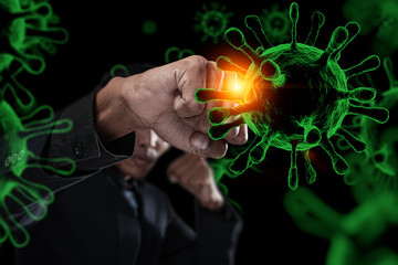 Businessman battle prevention Coronavirus COVID-19 outbreak . Business preparation, protection, precaution concept .